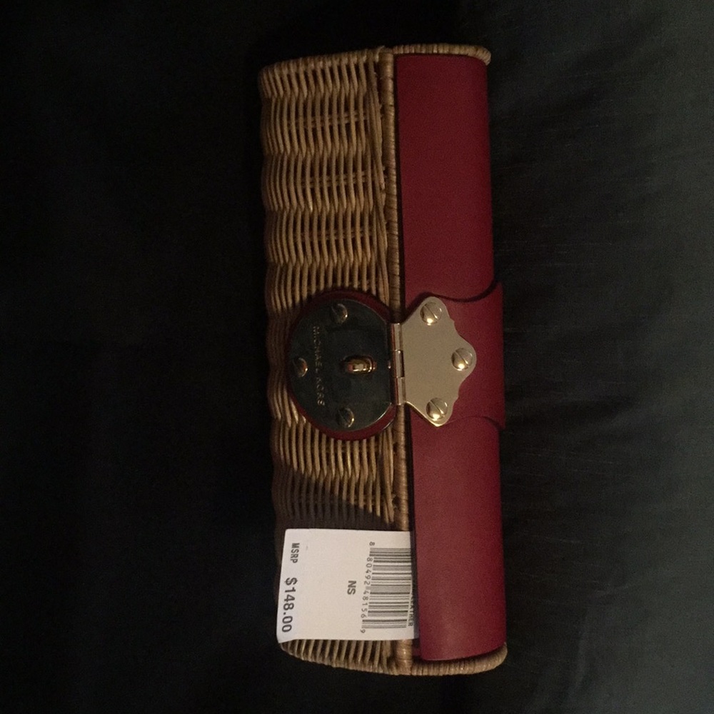 Michael Kors clutch metal hardware